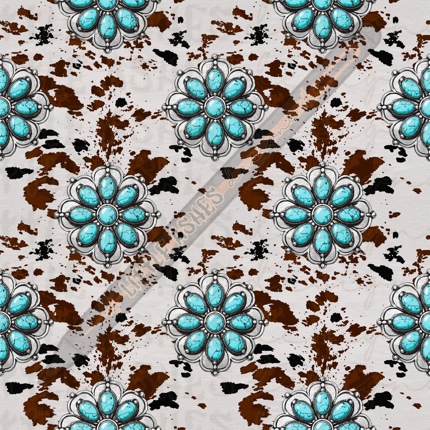 Cow print and cowgirl jewels